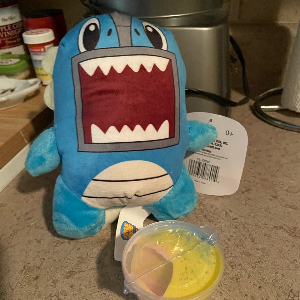 Blue Monster Plush Toy with Multicolored Slime